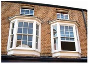 Английские вертикально-сдвижные окна из дерева .